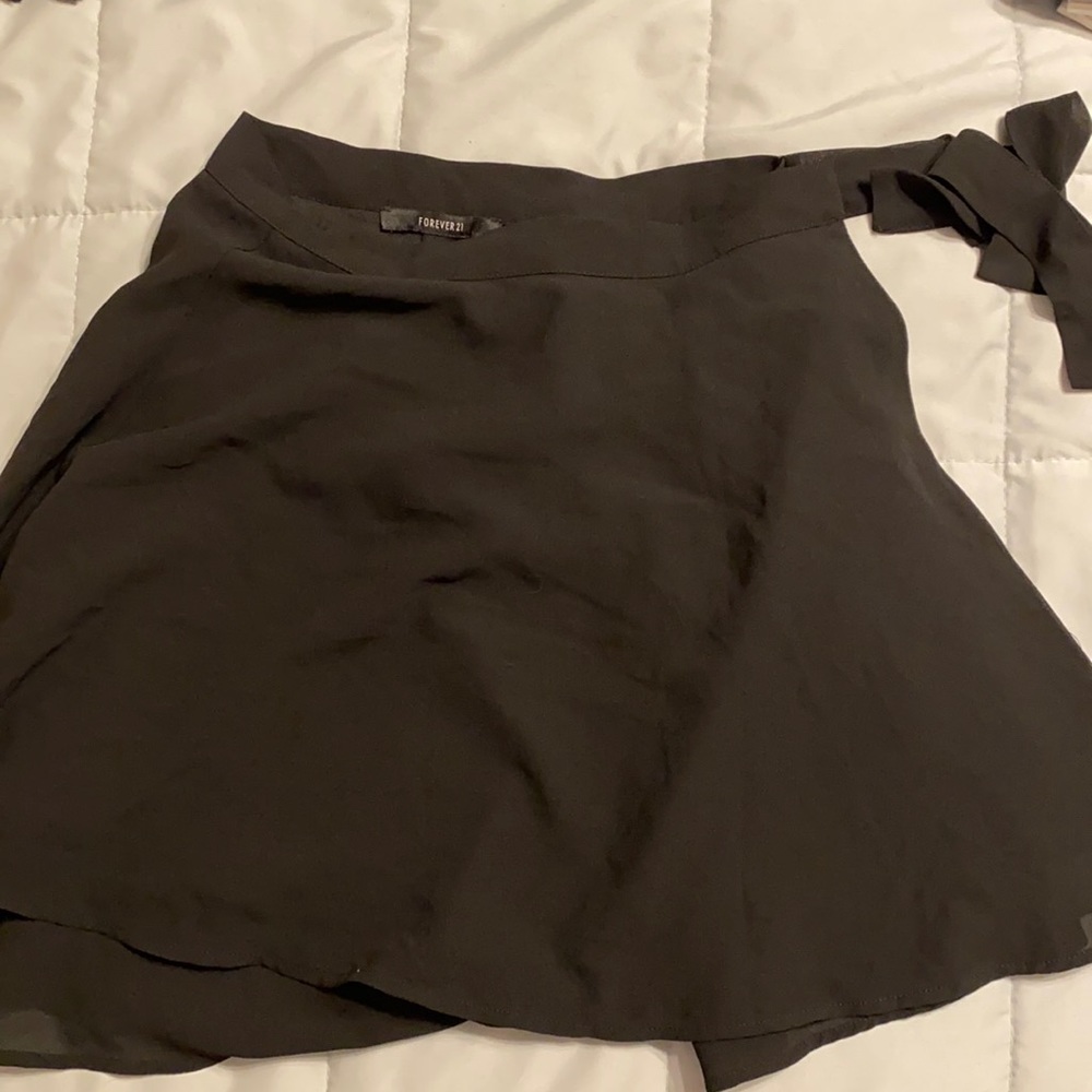 flowy, wrap around, black skirt.